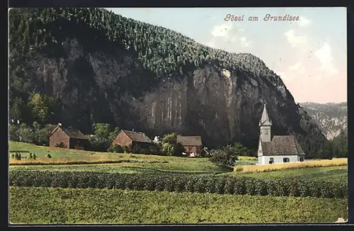 AK Gössl, Ortsansicht mit Kirche und Gebirgswand
