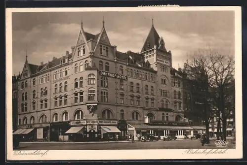 AK Düsseldorf, Bahnhofshotel mit Geschäften und Strasse