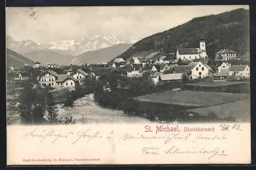 AK St. Michael /Obersteiermark, Blick über Wasser auf den Ort