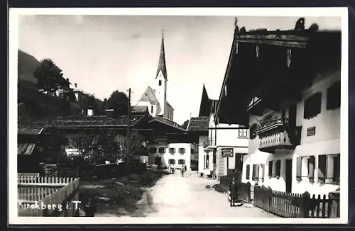 AK Kirchberg i. T., Strassenpartie mit Kirche