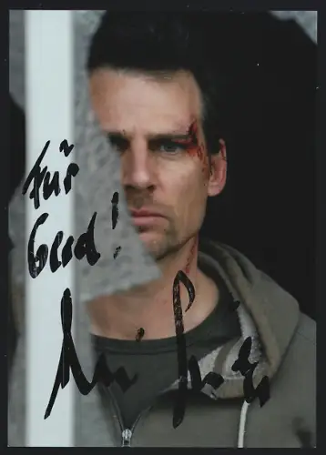 AK Rene Steinke mit Streifschuss in einer Filmszene, Autograph