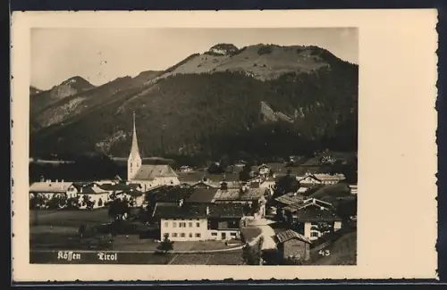 AK Kössen /Tirol, Totalansicht mit Kirche und Bergen aus der Vogelschau