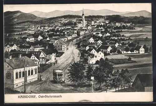 AK Kaindorf, Strassenpartie mit Auto und Blick zur Kirche