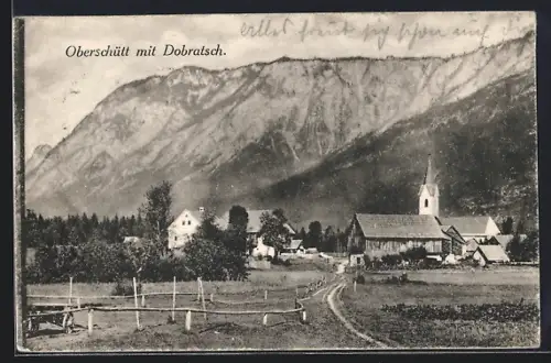 AK Villach, Oberschütt, Ortspartie mit Kirche und Dobratsch