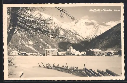 AK Mallnitz in Kärnten, Ortspartie mit Kirche im Schnee
