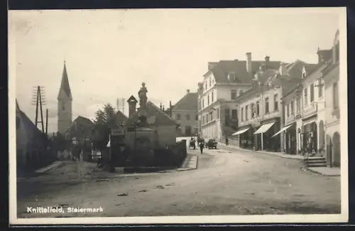 AK Knittelfeld /Stmk., Strassenpartie, Blick zur Kirche