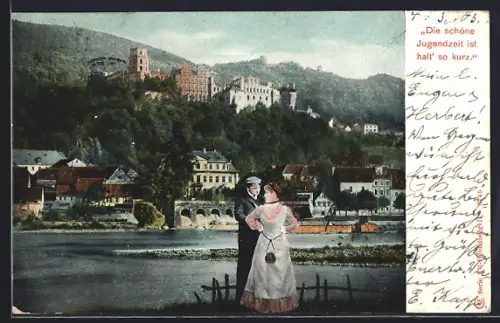 AK Liebespaar an einer Flusspartie mt Ortsansicht, studentische Szene