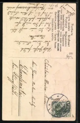 AK Kinder hängen eine Blumengirlande auf