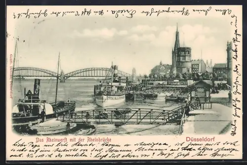 AK Düsseldorf, Das Rheinwerft mit der Rheinbrücke und angelegten Dampfern