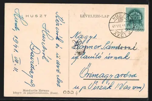 AK Huszt, Bahnhof, Strassenpartie im Ort