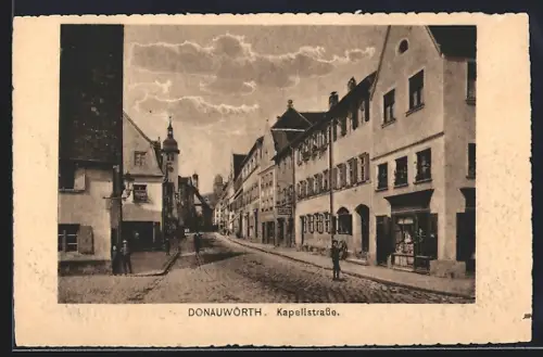 AK Donauwörth, Kapellstrasse mit Geschäft und Turmblick