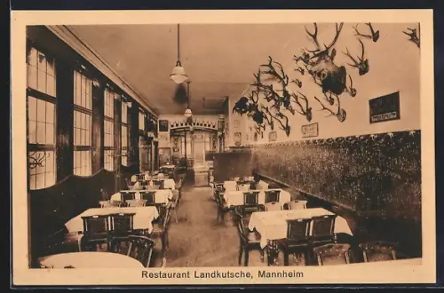 AK Mannheim, Restaurant Landkutsche E. Schlipf, Innenansicht mit Geweihen an der Wand
