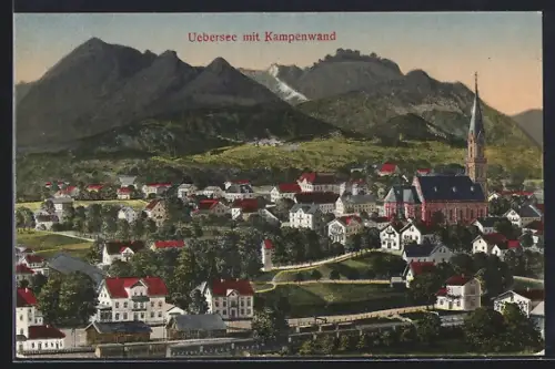 AK Uebersee, Totalansicht mit Eisenbahnzügen u. Kampenwand aus der Vogelschau