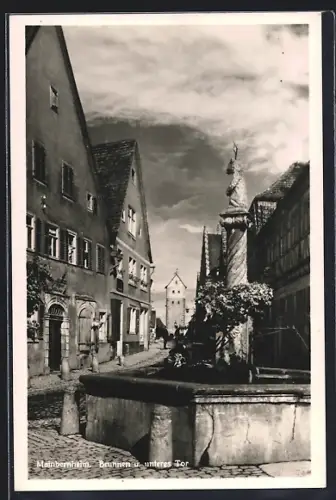 AK Mainbernheim, Brunnen und unteres Tor mit Metzgerei
