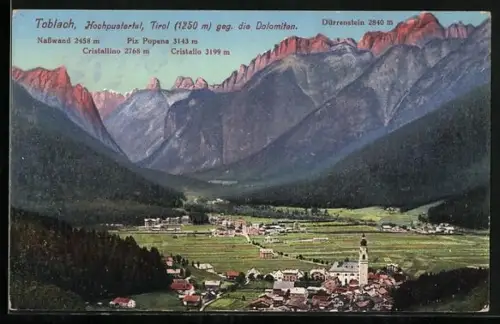 AK Toblach, Teilansicht mit Kirche gegen die Dolomiten, Dürrenstein, Nasswand, Piz Popena