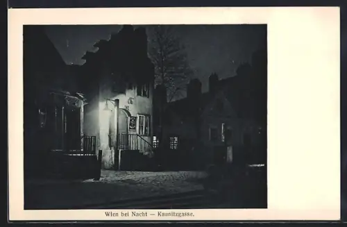 AK Wien, Blick in die Kaunitzgase mit beleuchtetem Haus