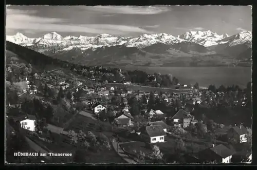AK Hünibach am Thunersee, Totalansicht mit Alpenkette Mönch bis Blümlisalp