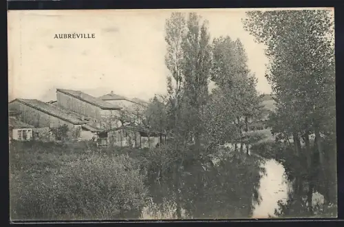AK Aubréville, Vue des bâtiments industriels près de la rivière