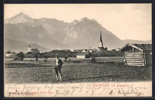 AK Garmisch, Ortspartie mit Kirche und Zugspitze