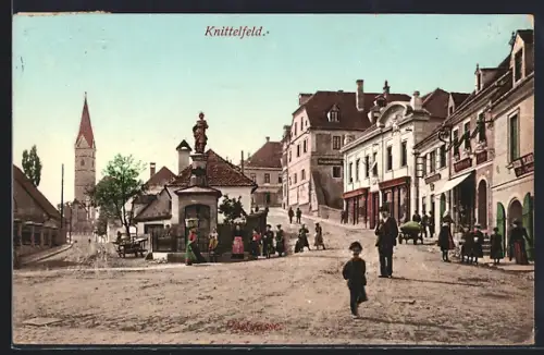 AK Knittelfeld, Strassenpartie mit Denkmal