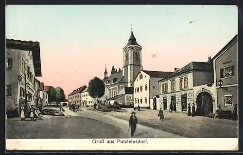 Goldfenster-AK Putzleinsdorf, Strassenpartie, Häuser mit leuchtenden Fenstern