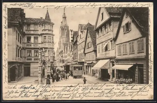 AK Reutlingen, Strassenbahn vor dem Geschäft von S. Nauenmeier