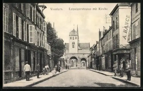AK Vouziers, la rue de Leipzig avec l`église dans le fond