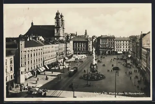 AK Linz a. D., Platz des 12. November mit Denkmal