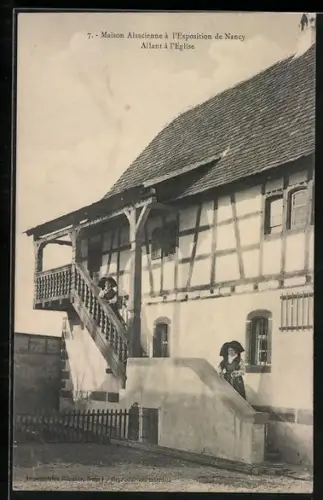 AK Nancy, Maisons Alsaciennes à l`Exposition - Allant à l`Eglise