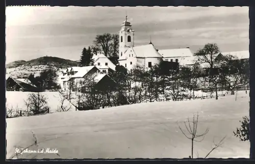 AK St. Johann i. d. Haide, Ortsansicht im Winter von der Feldflur aus