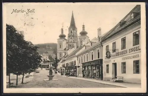 AK Maria-Zell, Strassenpartie mit Gasthof zum weissen Engel, Brunnen u. Kirche