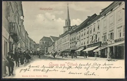 AK Villach, Hauptplatz mit Laden Mathias Fürst und Leuten um 1900