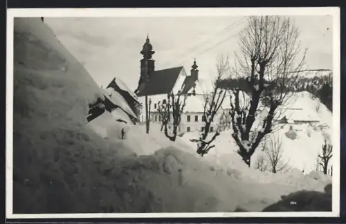 AK Annaberg, Ortsansicht mit Schneehang u. Kirche im Winter