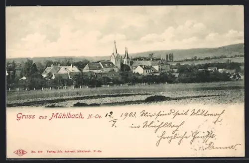 AK Mühlbach /N.-Ö., Ortspanorama mit Kirchen von einem Acker aus