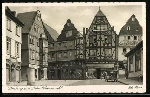 AK Limburg a. d. Lahn, Kornmarkt mit Gasthaus u. Geschäften, Litfasssäule