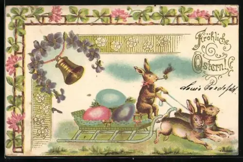 Präge-AK Osterhase im Schlitten mit Ostereiern, Veilchen und Kleeblätter