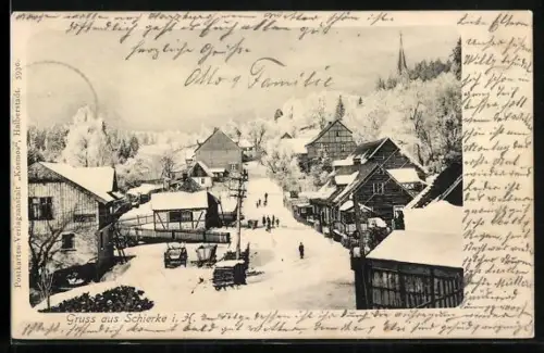 AK Schierke i. H., Winterliche Ortsansicht mit verschneiten Häusern und Kirche