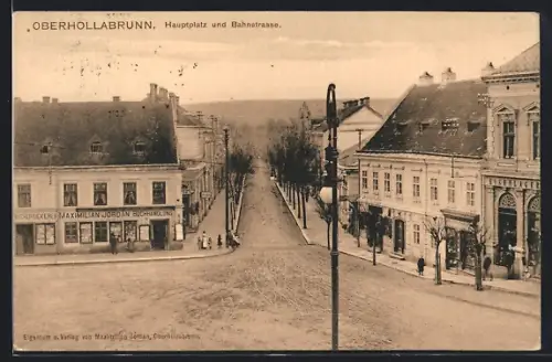 AK Oberhollabrunn, Hauptplatz und Bismarckstrasse mit Geschäften