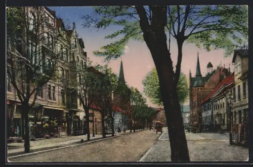AK Uelzen, Bahnhofstrasse mit Kirche