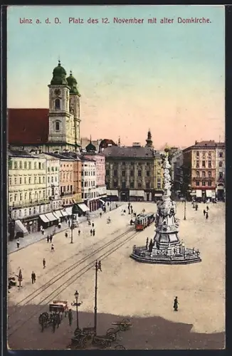 AK Linz a. d. D., Platz des 12. November mit alter Domkirche und Strassenbahn