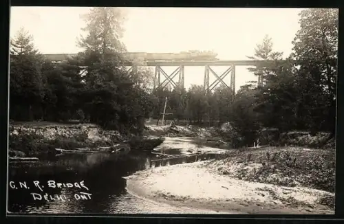 AK Delhi /Ont., C. N. R. Bridge with passing train