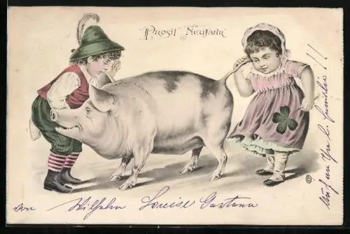 AK Kleines Trachtenpaar beim Telefonspiel mit Schwein, Neujahrsgruss