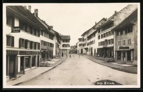 AK Bülach, Schuhhandlung, Metzgerei und Hans Oberli im Ort