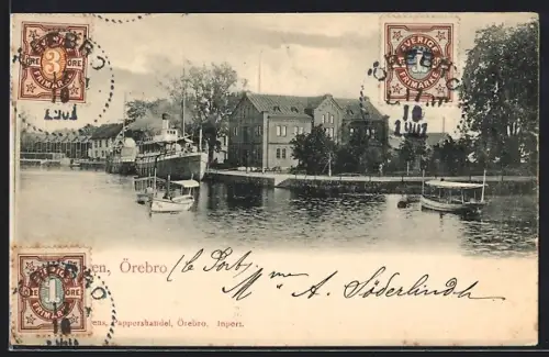 AK Örebro, Uferpartie mit Dampfer