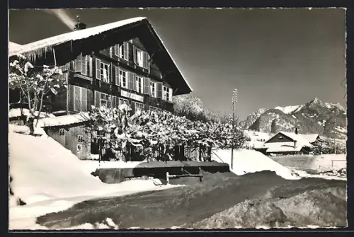 AK Oberwil i. S., Hotel Bahnhof mit Umgebung im Winter