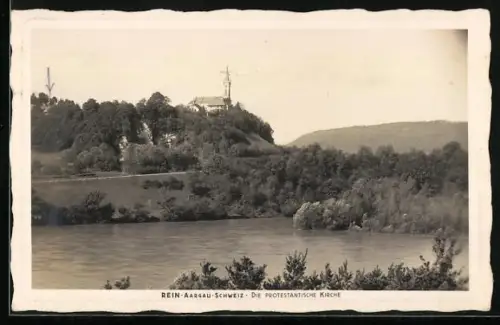 AK Rein /Aargau, Blick über den Fluss zur protestantischen Kirche