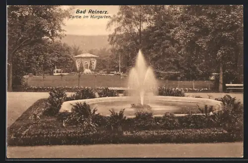 AK Bad Reinerz, Partie im Kurgarte mit Fontäne