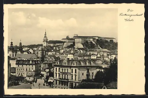 AK Glatz, Ortsansicht mit Kirche und Festung im Hintergrund