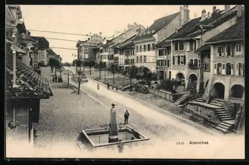 AK Avenches, Strassenpartie mit Wohngebäuden und Brunnen