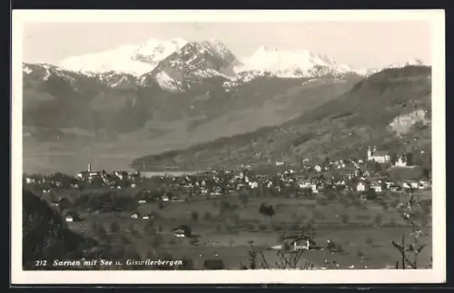 AK Sarnen, Ortsansicht mit See und Giswilerbergen